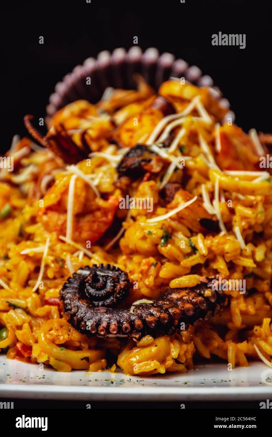 Delicious Octopus Tentacles with fried rice Stock Photo - Alamy