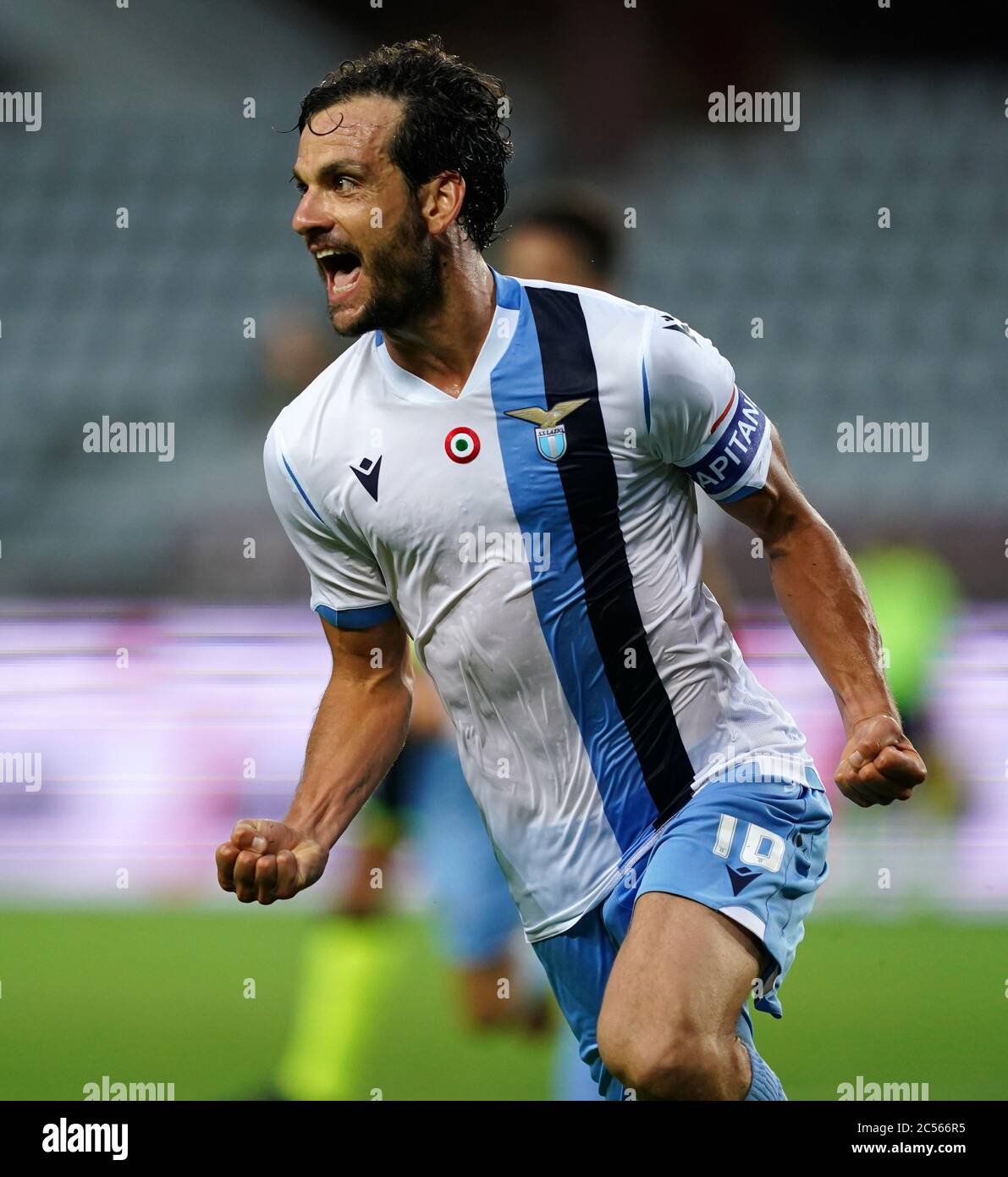 Turin. 1st July, 2020. Lazio's Marco Parolo celebrates his goal during a Serie A football match between Torino and Lazio in Turin, Italy, June 30, 2020. Credit: Xinhua/Alamy Live News Stock Photo