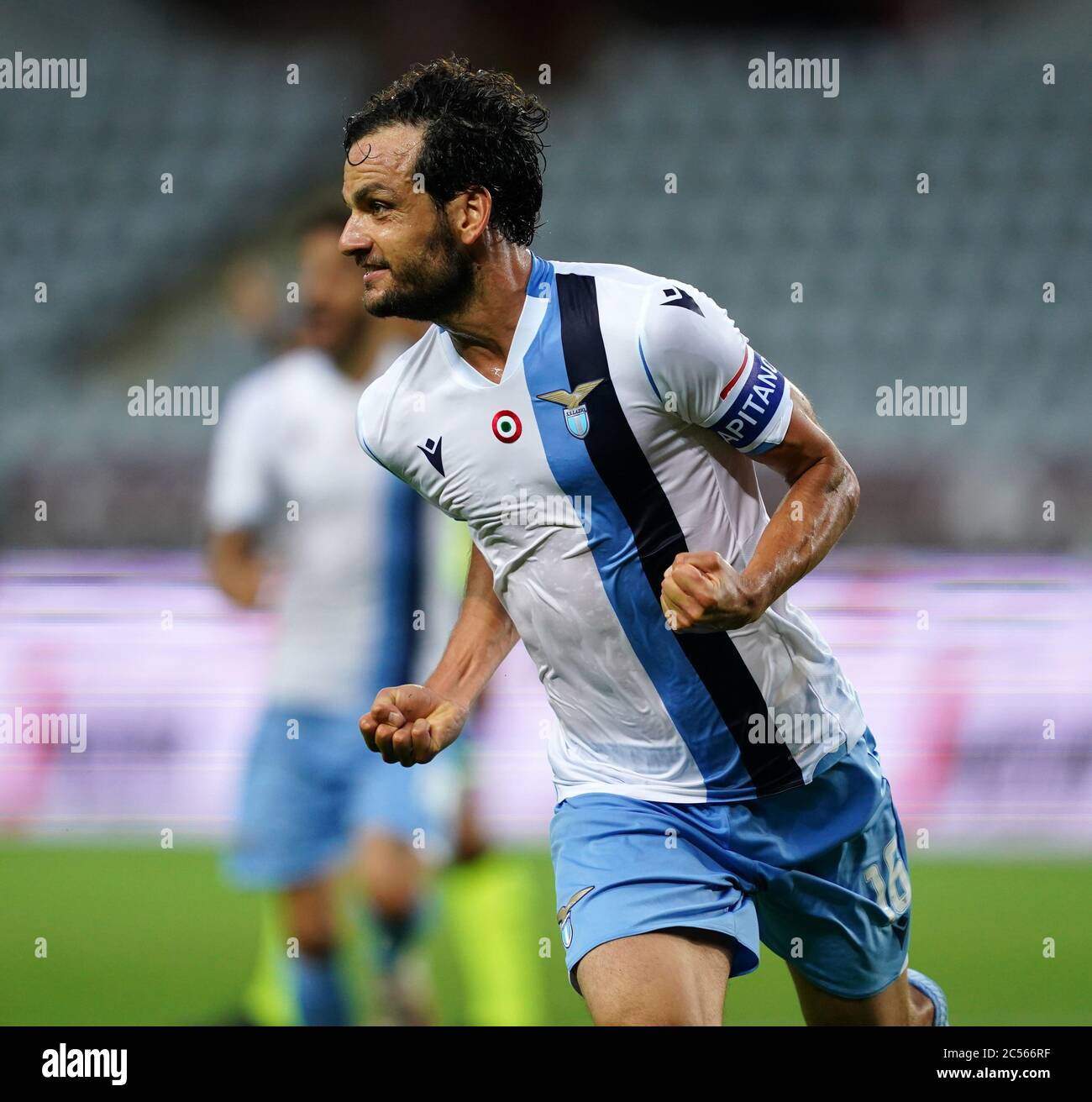 Turin. 1st July, 2020. Lazio's Marco Parolo celebrates his goal during a Serie A football match between Torino and Lazio in Turin, Italy, June 30, 2020. Credit: Xinhua/Alamy Live News Stock Photo
