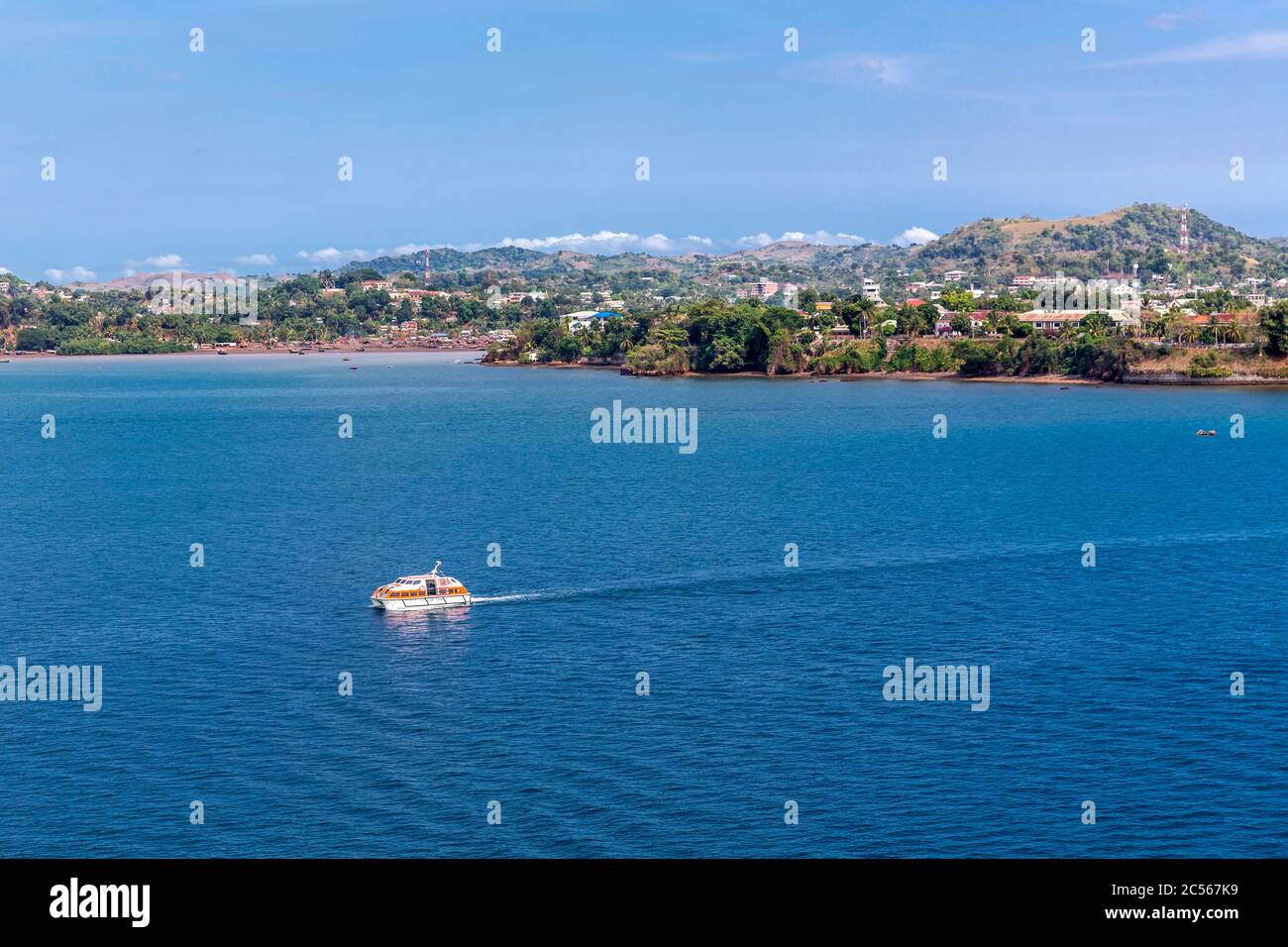Tender boats, view from cruise ship to ferry terminal, Andoany, Hell-Ville, Nosy Bé, Madagascar, Africa, Indian Ocean Stock Photo