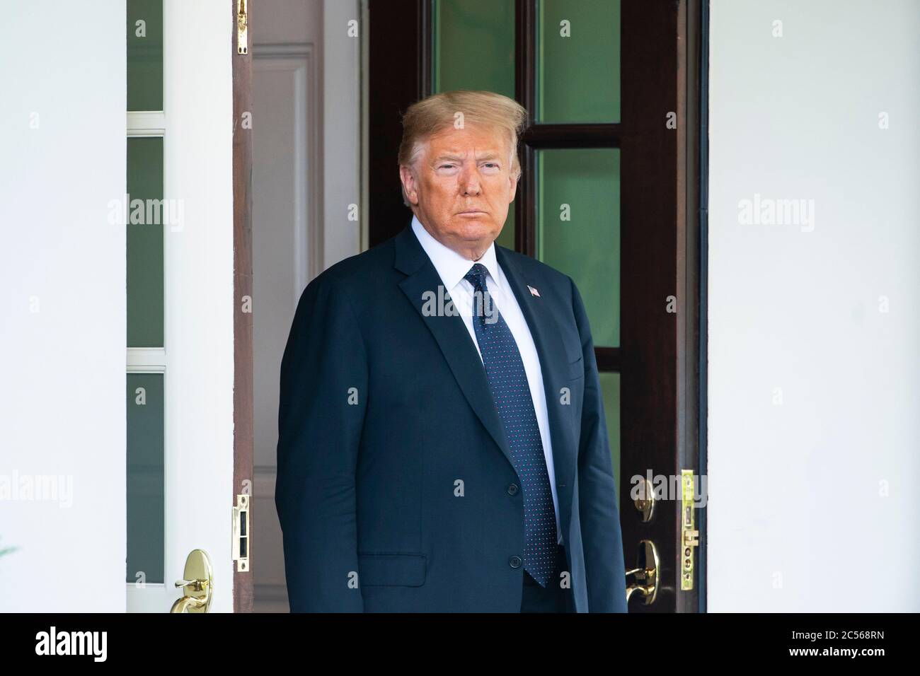 US President Donald J. Trump waits to welcome Polish President Andrzej ...