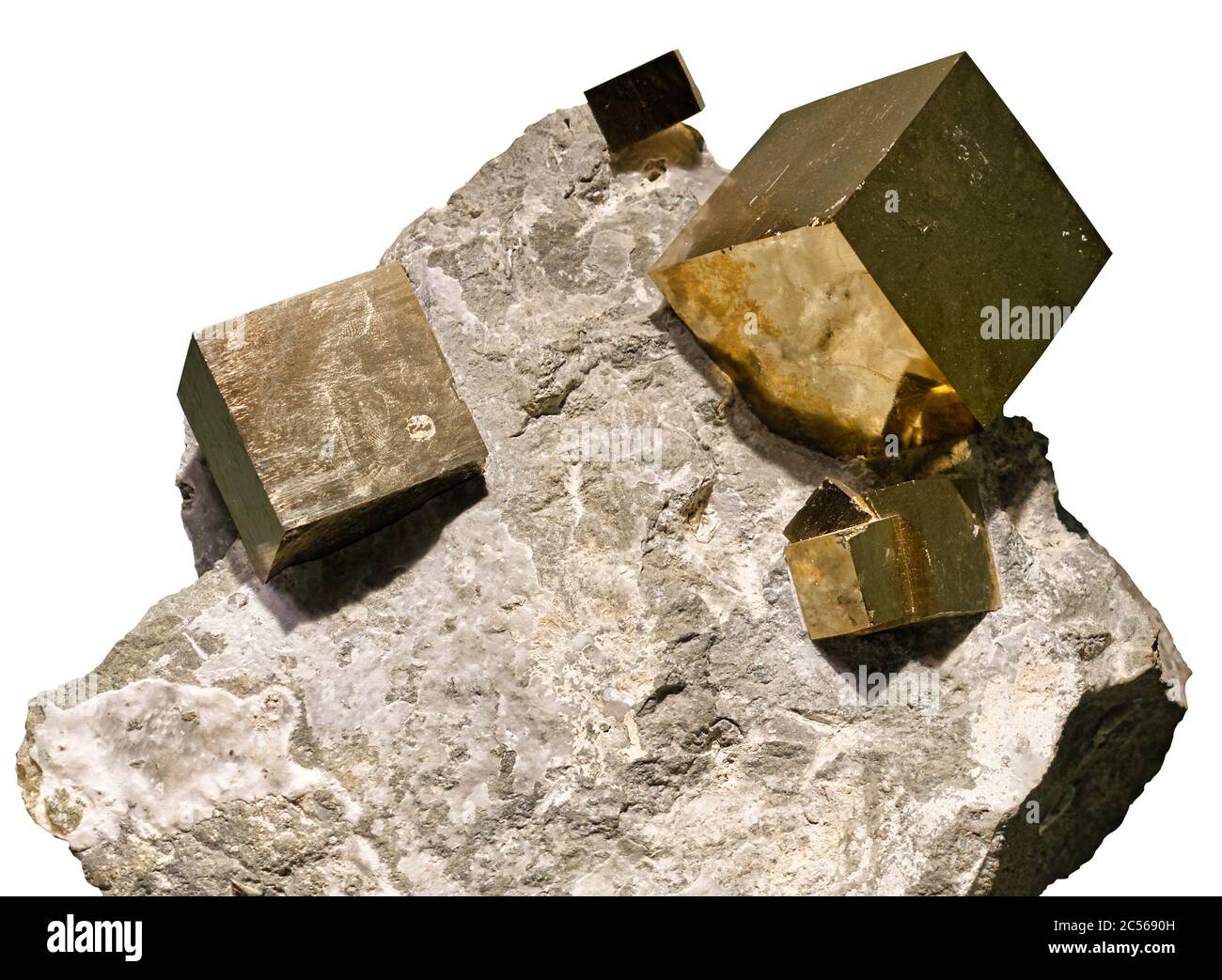 Pyrite cubic crystals embedded in a matrix on white background Stock Photo