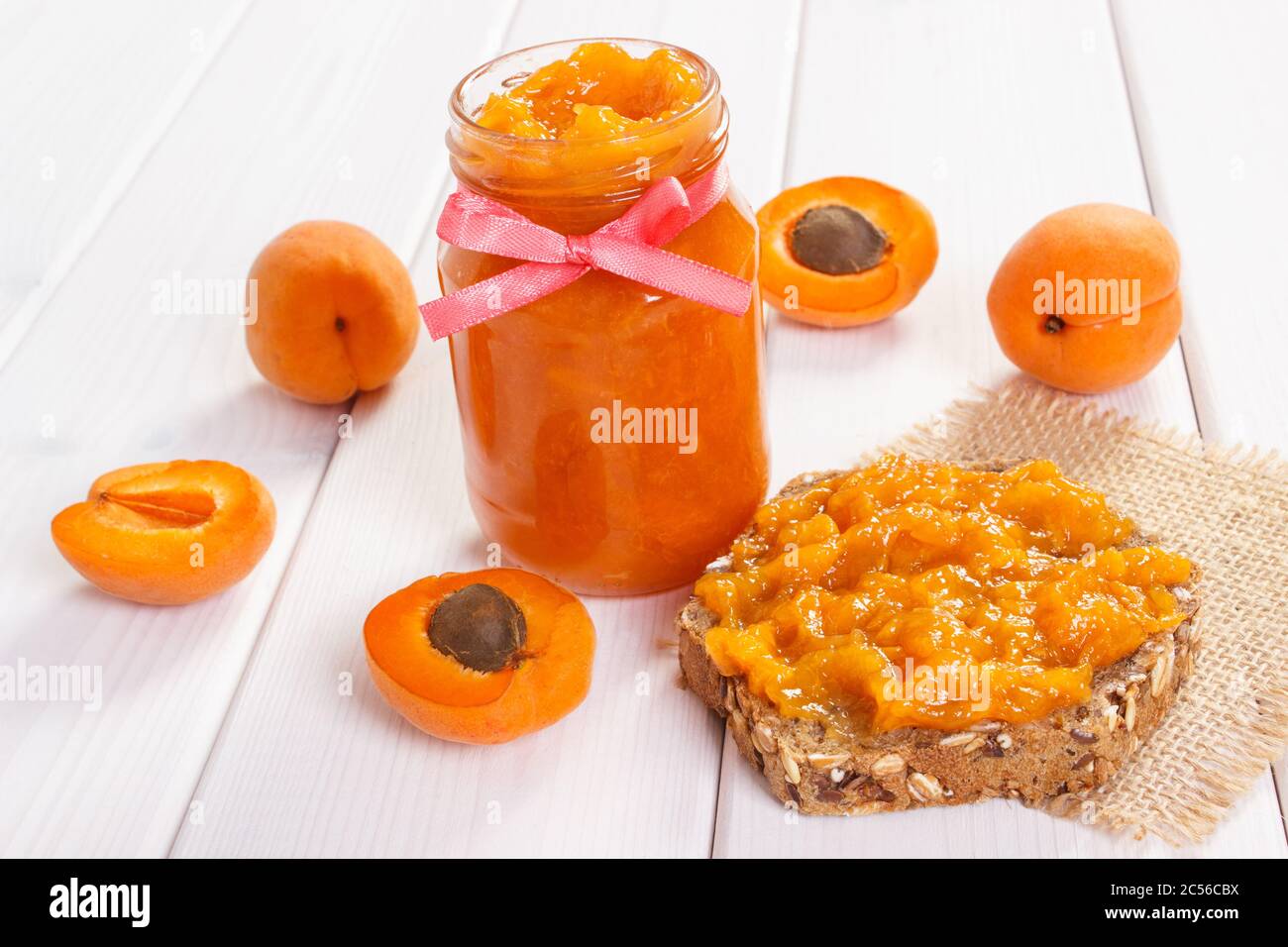 Fresh prepared snack with homemade apricot marmalade, concept of healthy sweet eating Stock Photo