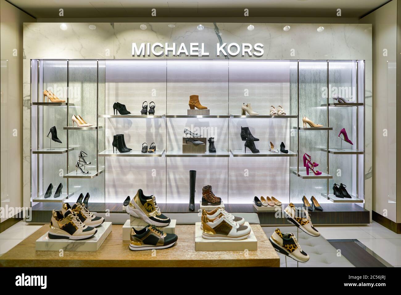 Michael Kors Unveils MKGO Graffiti Capsule  Store design interior Retail  design Shop interior design