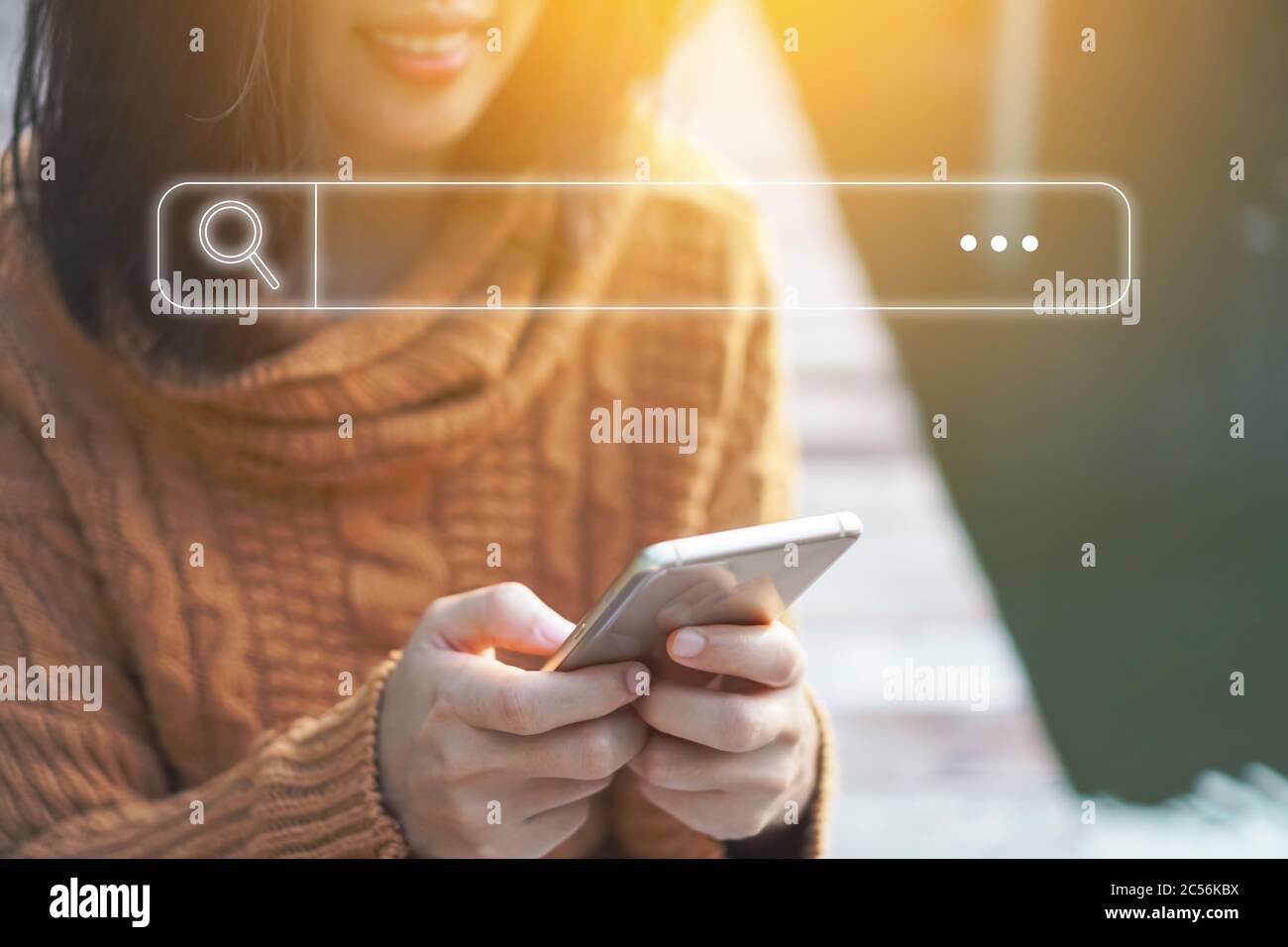 People hand using mobile phone or smartphone searching for information in  internet online society web with search box icon and copyspace Stock Photo  - Alamy