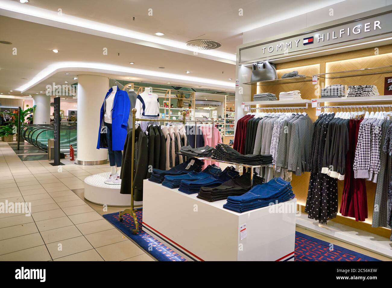 BERLIN, GERMANY - CIRCA SEPTEMBER, 2019: Tommy Hilfiger clothes on display at the Kaufhaus des (KaDeWe) department store in Berlin Stock Photo - Alamy