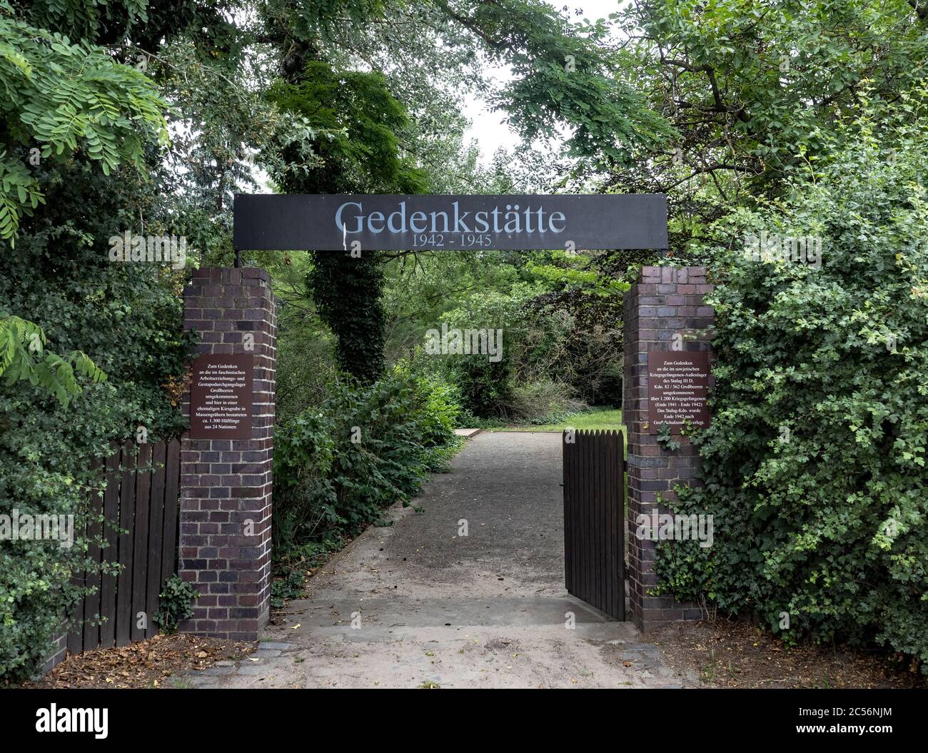 25 June 2020, Brandenburg, Großbeeren: The gates to the memorial for the victims of the former work education camp in Großbeeren, Brandenburg, are open. Between 1942 and 1945 1289 prisoners from 25 countries died there. Photo: Paul Zinken/dpa-Zentralbild/ZB Stock Photo