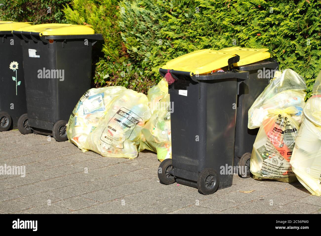 Waste separation, yellow bins for plastic waste, Bremen, Germany