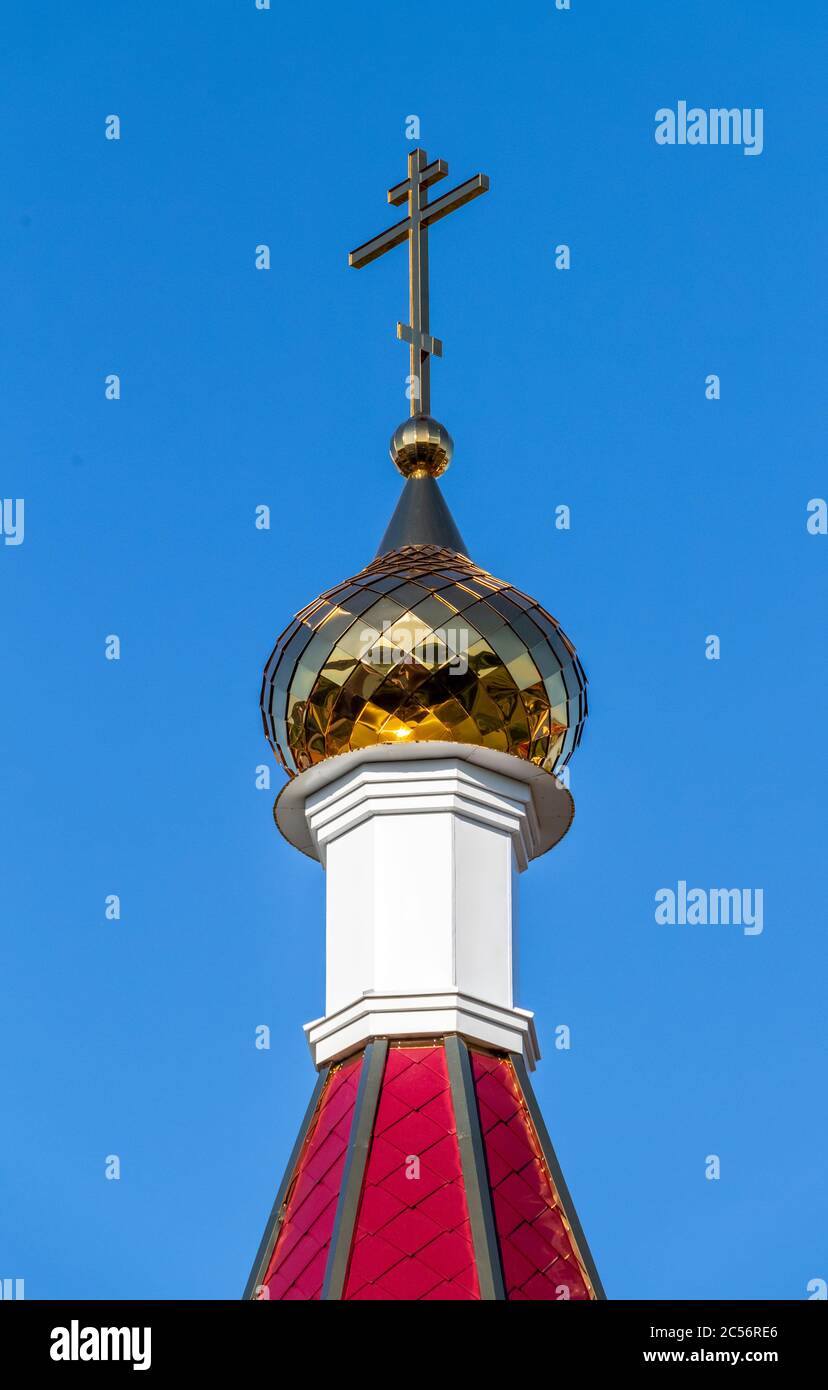 Golden cross on the dome of an Orthodox church close-up Stock Photo - Alamy