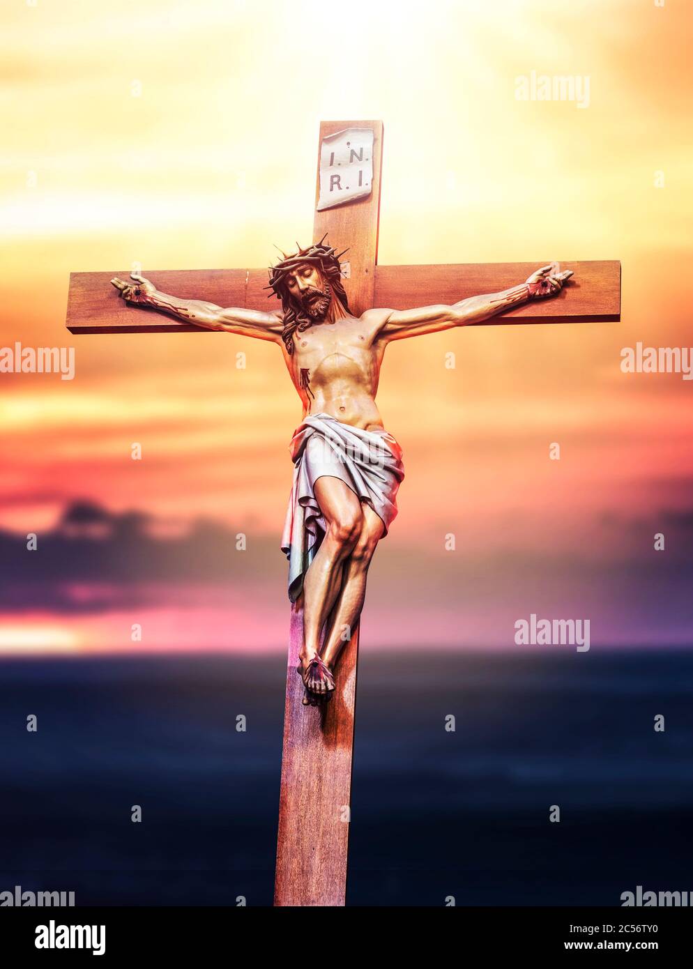 Jesus Christ crucifixion. Holy God Jesus sacrifice on cross. Christianity symbol. Stock Photo