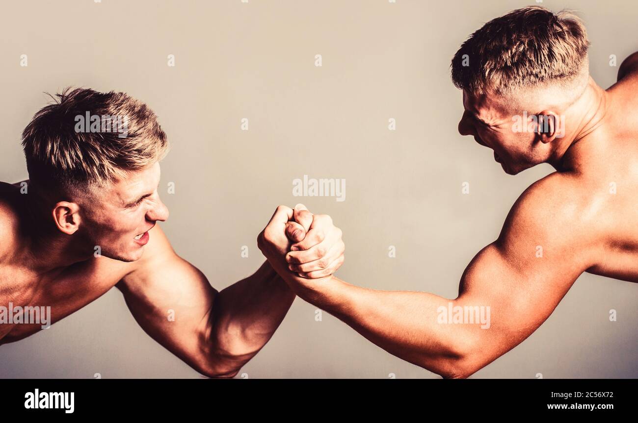Hand wrestling, compete. Hands or arms of man. Muscular hand. Two men