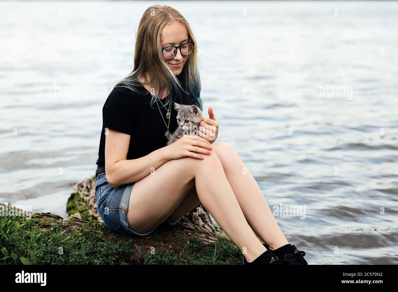 black shirt denim shorts