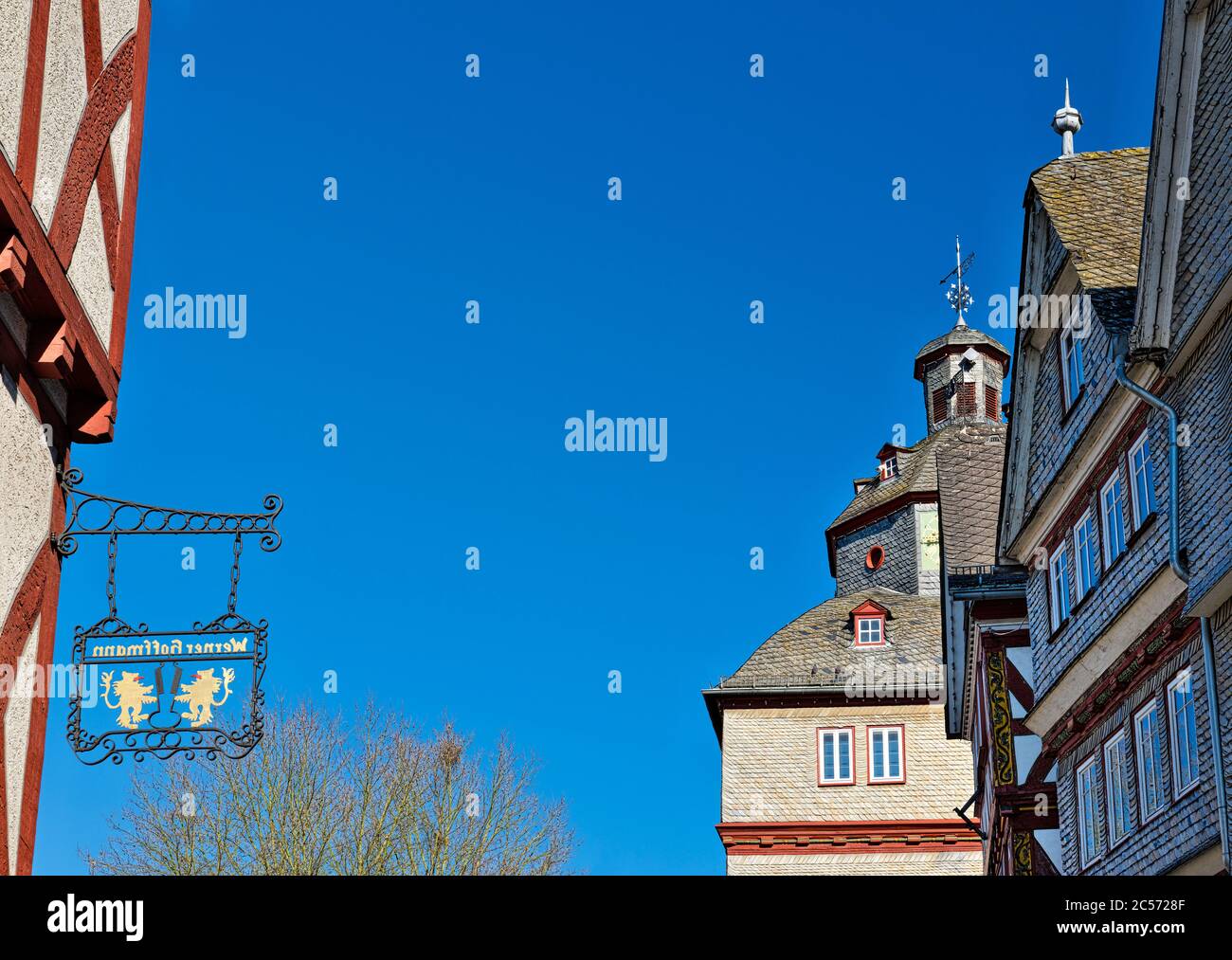Europe, Germany, Hesse, Lahn-Dill-Bergland nature park, Herborn town, half-timbered gable at the market square, town hall, guild coat of arms Stock Photo
