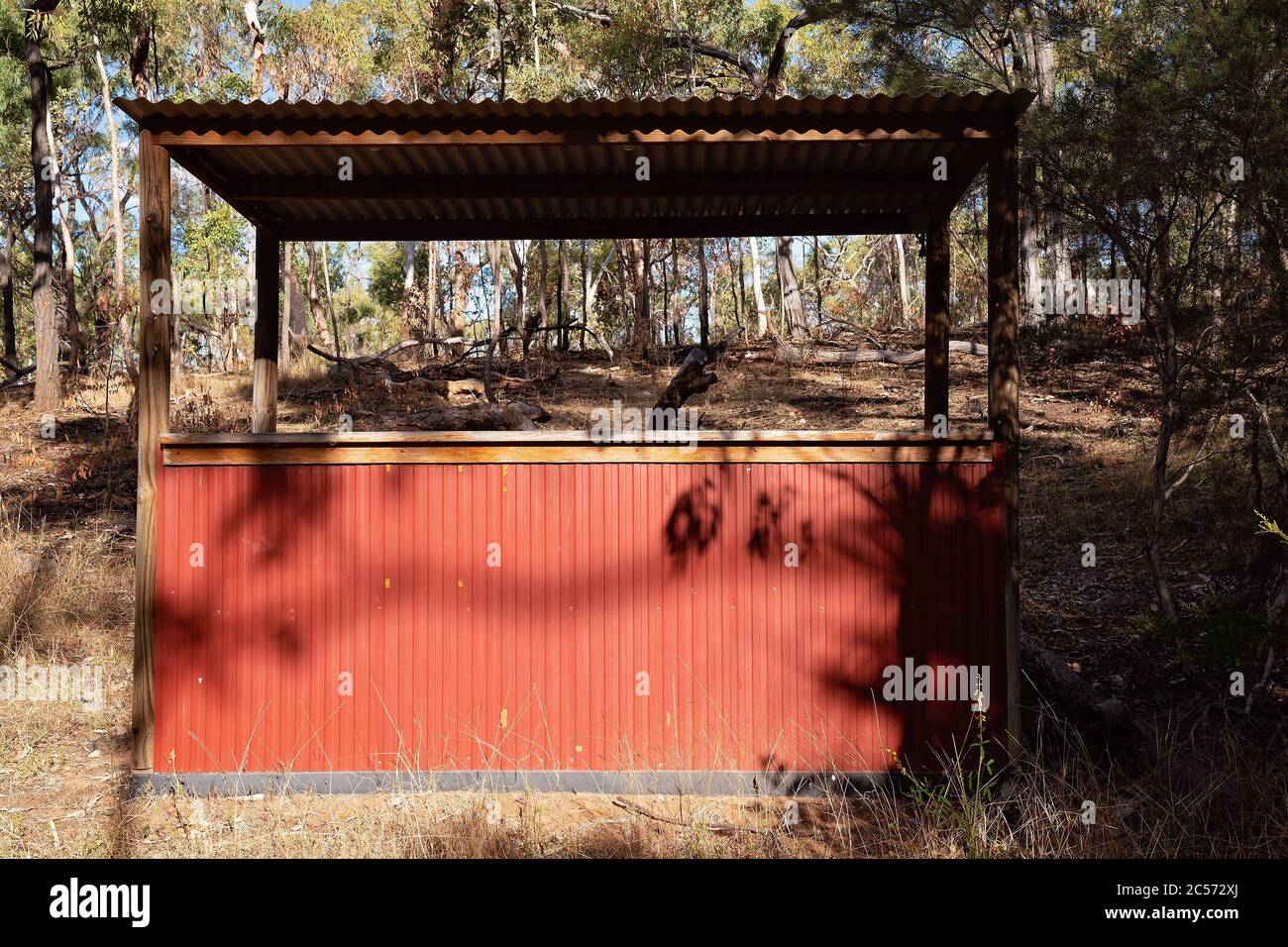 An old tin hut in the bush used for serving guests drinks at an