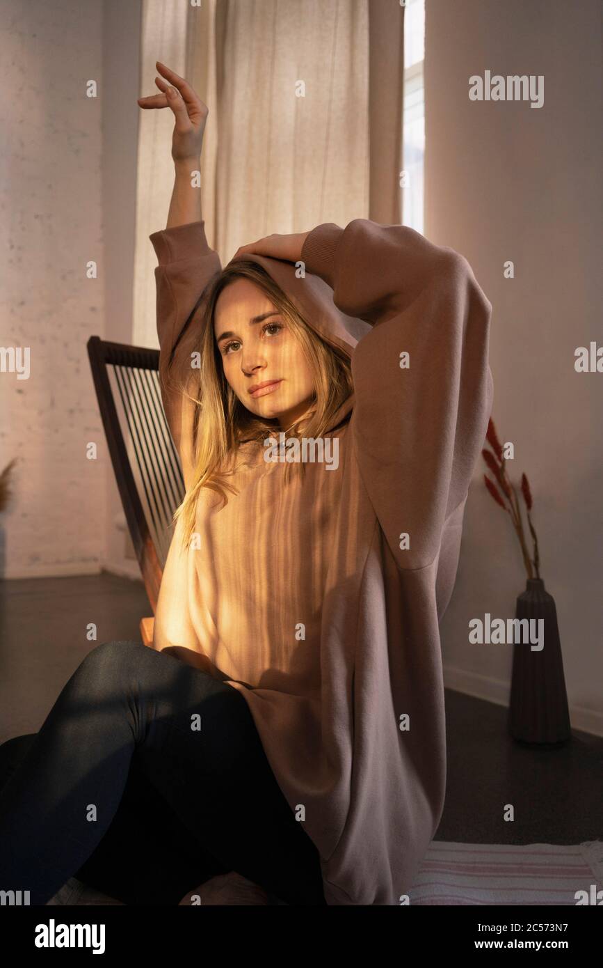 Stretching blonde woman posing hi-res stock photography and images - Alamy