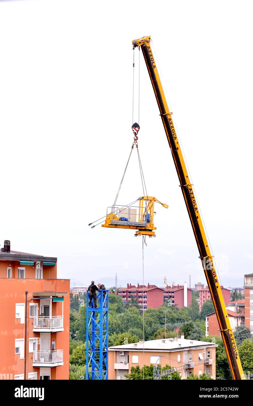 Tower crane builders hook the top, suspended in the void Stock Photo