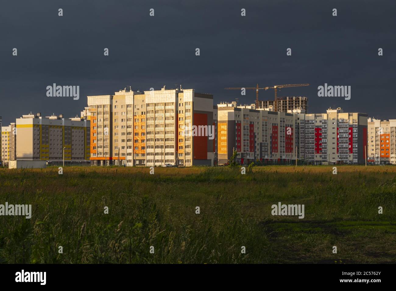 A Horizontal Shot Of Buildings At The Construction Site Under A Cloudy Sky At Sunset Stock Photo Alamy