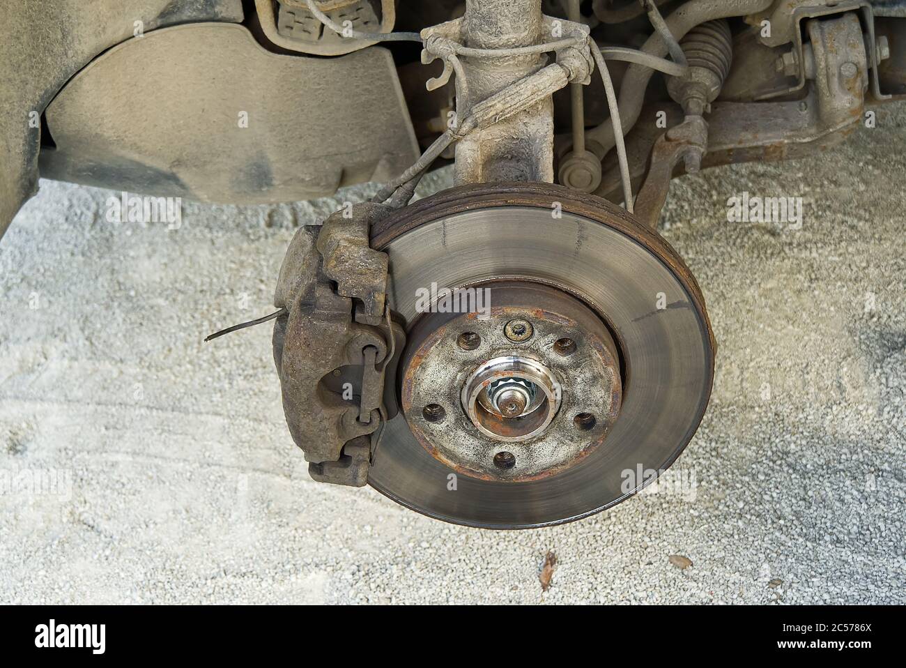 Old and dirty rear dump break of the vehicle for repair. Brakes on a