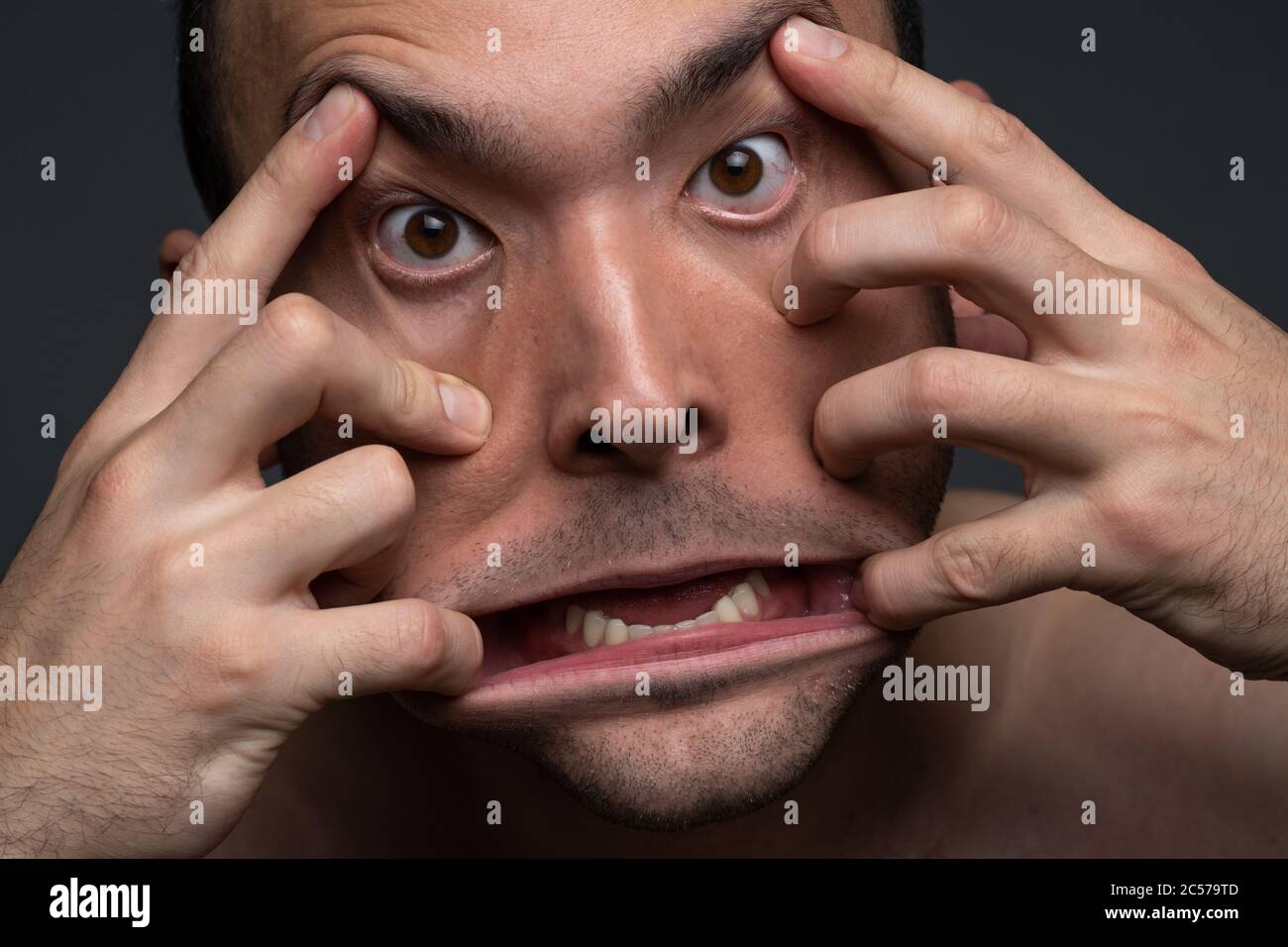 Photo of mad man, close up shooting Stock Photo