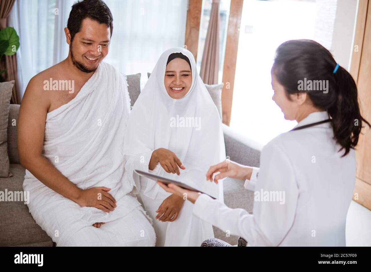 muslim medical checkup before hajj or umrah with doctor Stock Photo