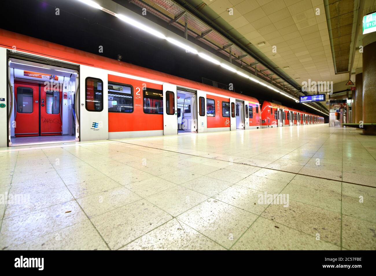 to the rush hour orphaned S-Bahn station Stadtmitte with empty train, lockdown during corona crisis, Stuttgart, Baden-Württemberg, Germany Stock Photo