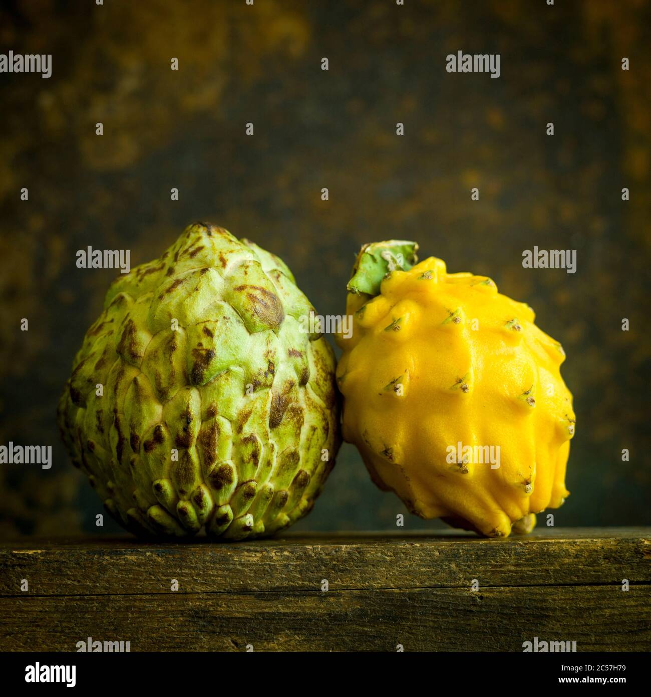 Yellow Pitaya (Hylocereus) and Fruit of annona squamosa Stock Photo