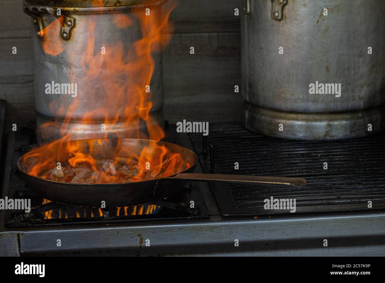 Process of frying and flaming shrimp in a pan Stock Photo - Alamy