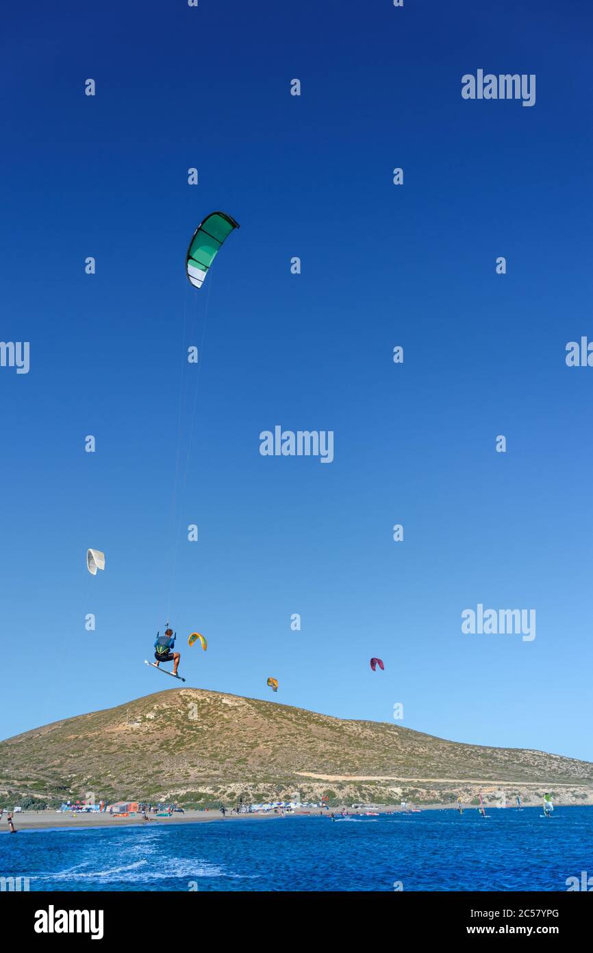 Kitesurfer in big jump in air on Prasonisi beach (Rhodes, Greece) Stock Photo