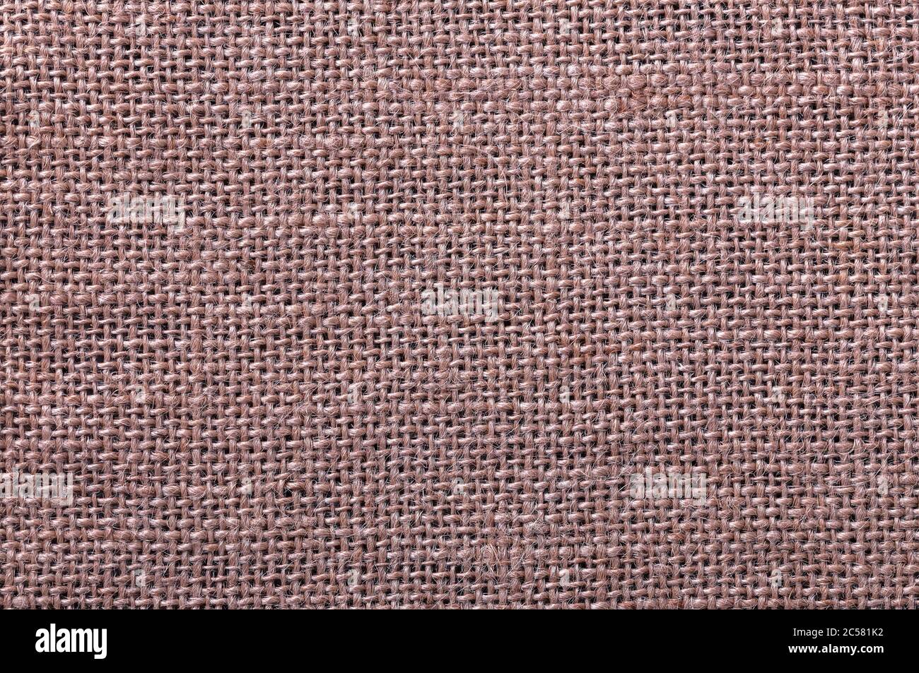 Weaving of twisted fiber, thread. Beautiful texture. Burlap fabric