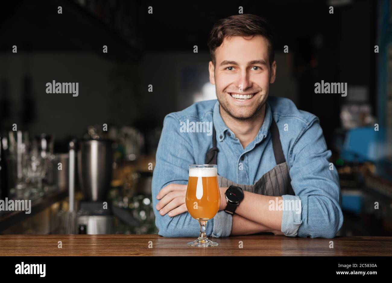 Bartender leaning on counter hi-res stock photography and images - Alamy