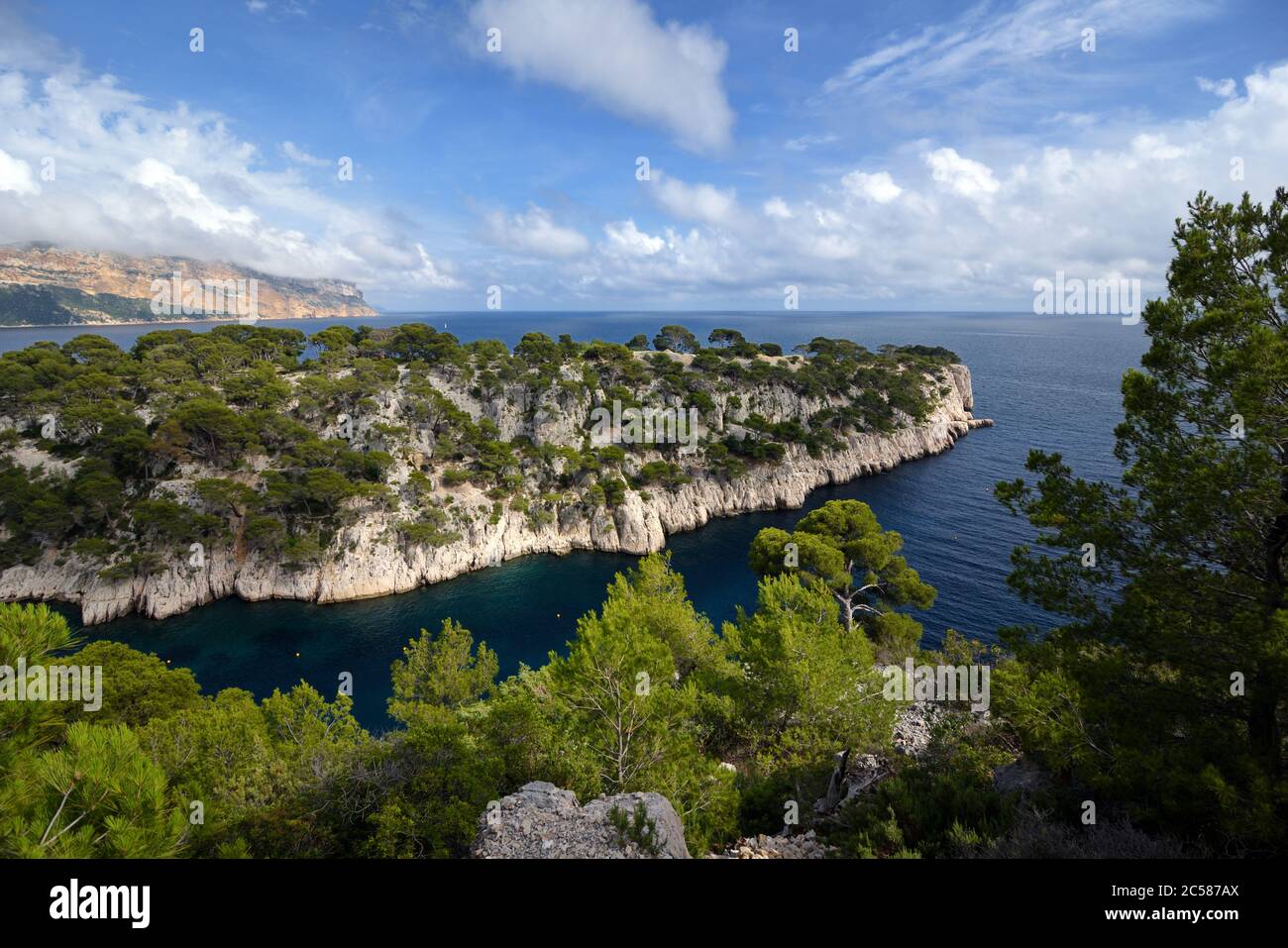 Calanque Port-Pin &, in distance, Cap Canaille Cape or Headland & Mediterranean Sea at Cassis in the Calanques National Park Provence France Stock Photo