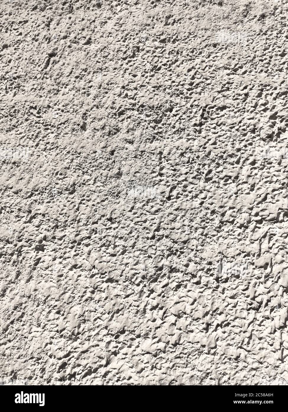 The texture of the plaster is fur coat on the wall. Seamless grey texture. Stock Photo