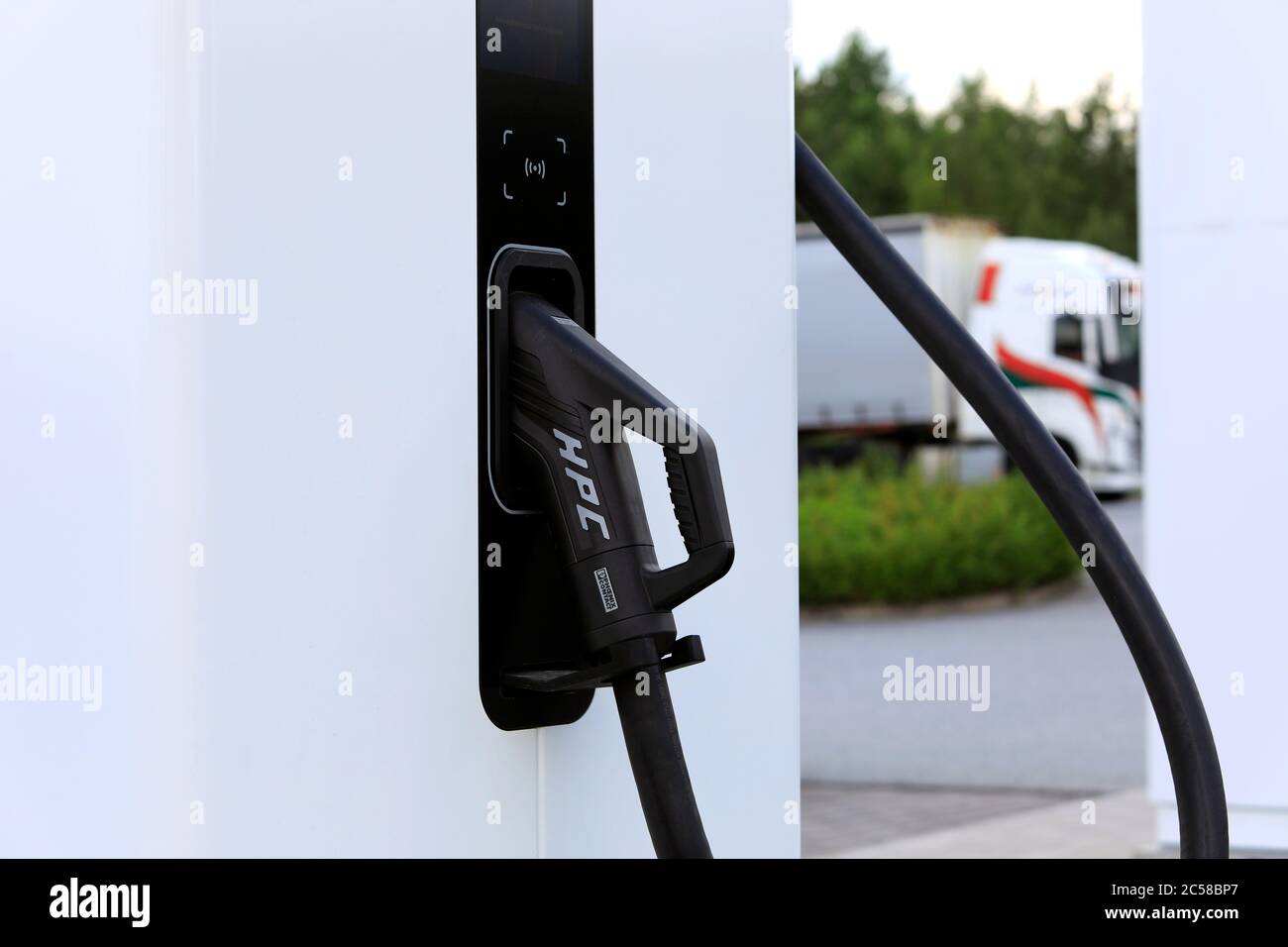 CCS, Combined Charging System plug or connector on IONITY high-power-charging (HPC) unit for electric vehicles.  Paimio, Finland. June 28, 2020. Stock Photo