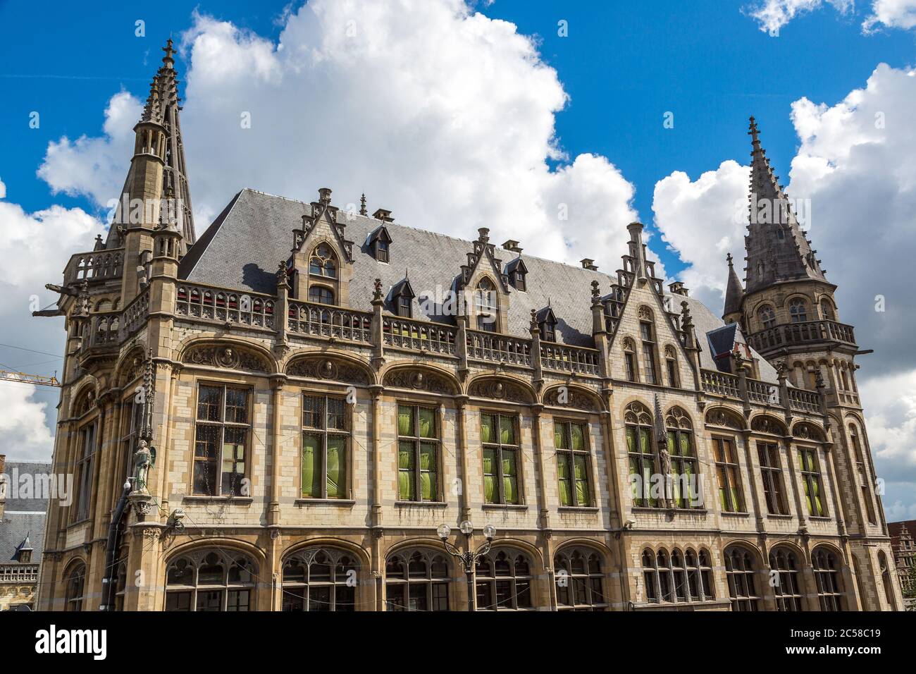 The facade of typical old house in Gent in a beautiful summer day ...