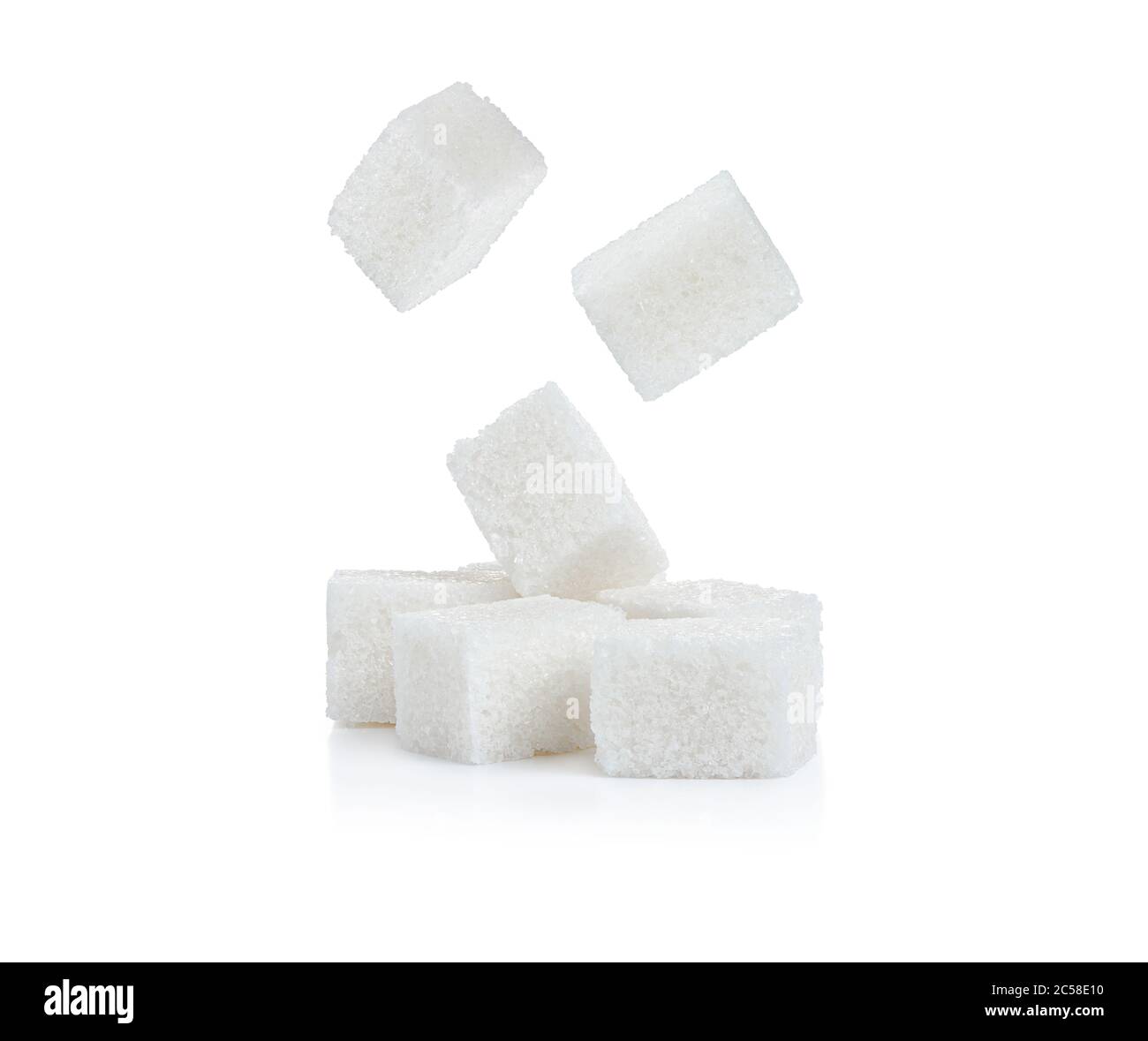 white sugar cubes, isolated on white background Stock Photo - Alamy