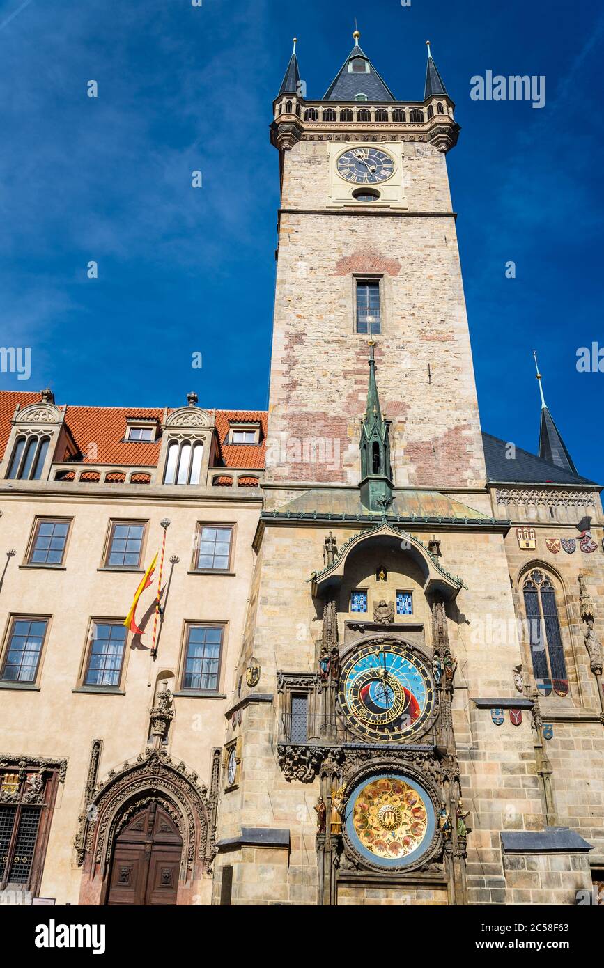 The Prague Astronomical Clock or Orloj in the old town of Prague. The medieval clock is mounted on the south wall of the Old Town Hall tower. Postcard Stock Photo