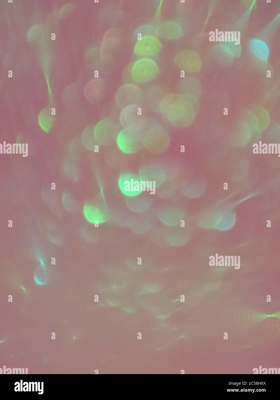 Vertical abstract shot of green blue bokeh lights background for ...