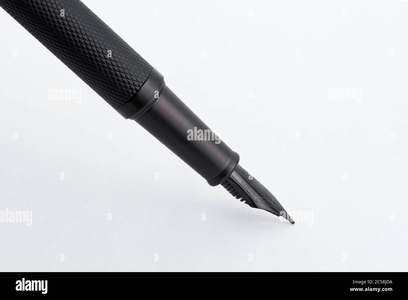Black fountain writing pen isolated on white background Stock Photo - Alamy