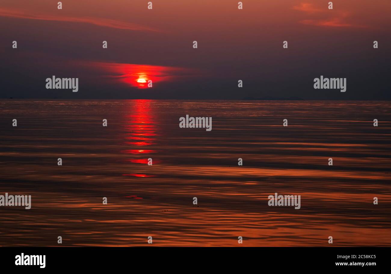 Beautiful sea Sunset. Seascape. Ocean and red sky with clouds Stock ...