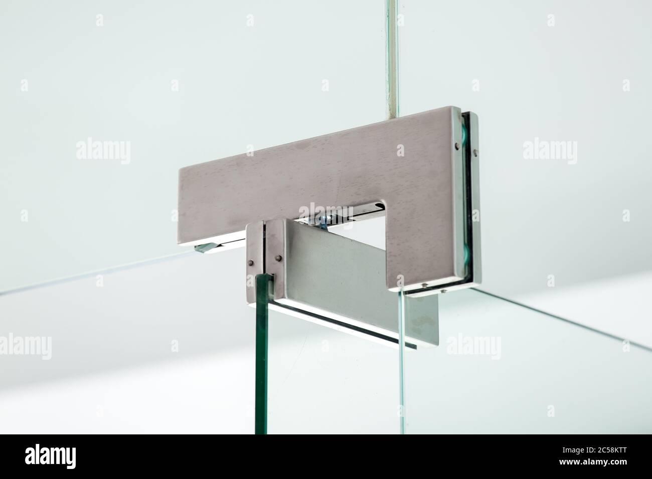 glass door hinges metal fittings with door locking mechanism, close up
