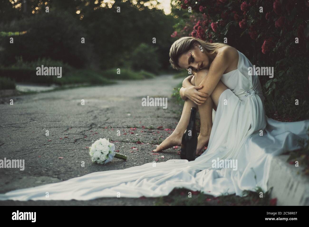 Thrown red wine wedding dress hires stock photography and images Alamy