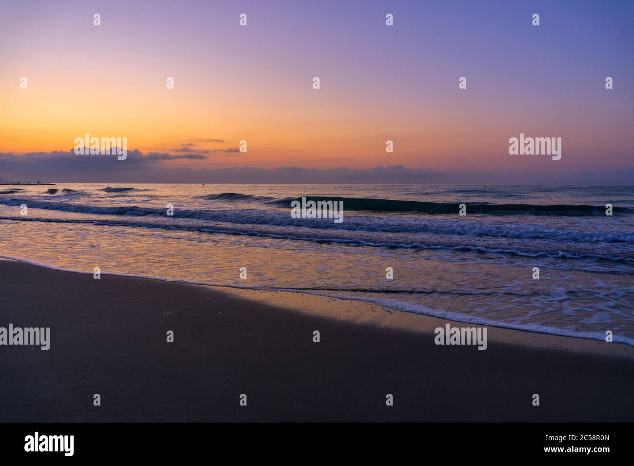 Sunrise on a beach in Benicassim, Costa azahar, Spain Stock Photo