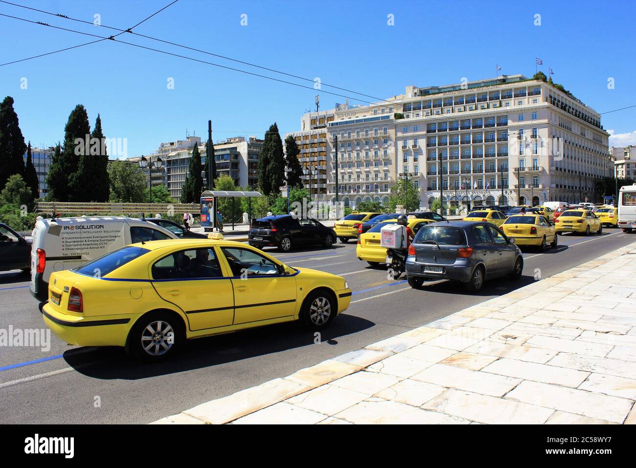 Greece, Athens, June 16 2020 - Heavy traffic on Amalias avenue with the Grande Bretagne hotel in the background. Stock Photo