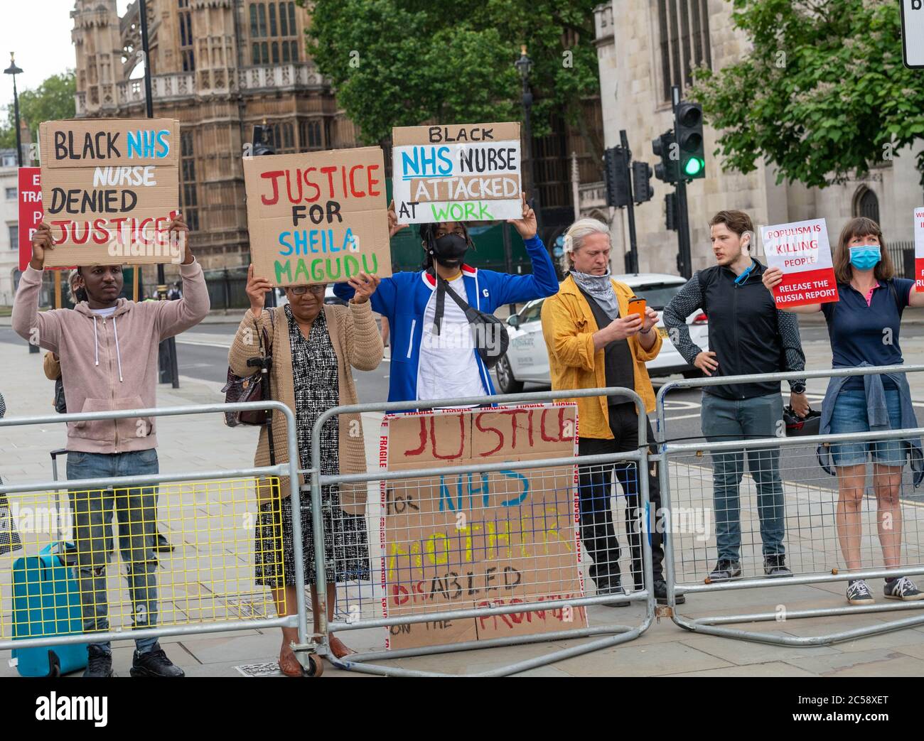 London, UK. 1st July, 2020. Boris Johnson, MP Prime Minister, arrives at the House of Commons with heightened, security. These demonstrators on the pavement were kept several meters away from the entrance and the the pavement on the other side of the road was sealed off. Credit: Ian Davidson/Alamy Live News Stock Photo