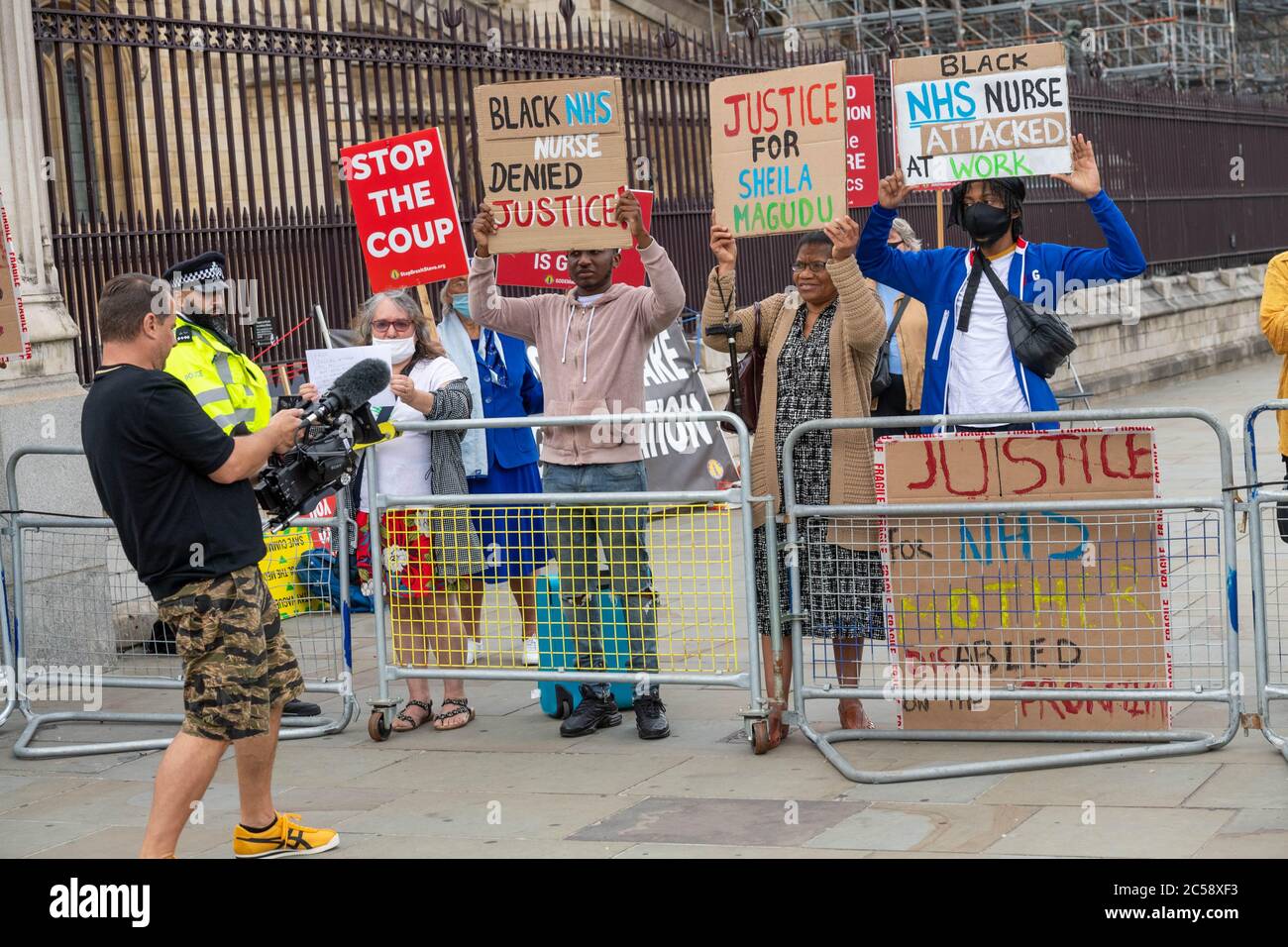 London, UK. 1st July, 2020. Boris Johnson, MP Prime Minister, arrives at the House of Commons with heightened, security. These demonstrators on the pavement were kept several meters away from the entrance and the the pavement on the other side of the road was sealed off. Credit: Ian Davidson/Alamy Live News Stock Photo