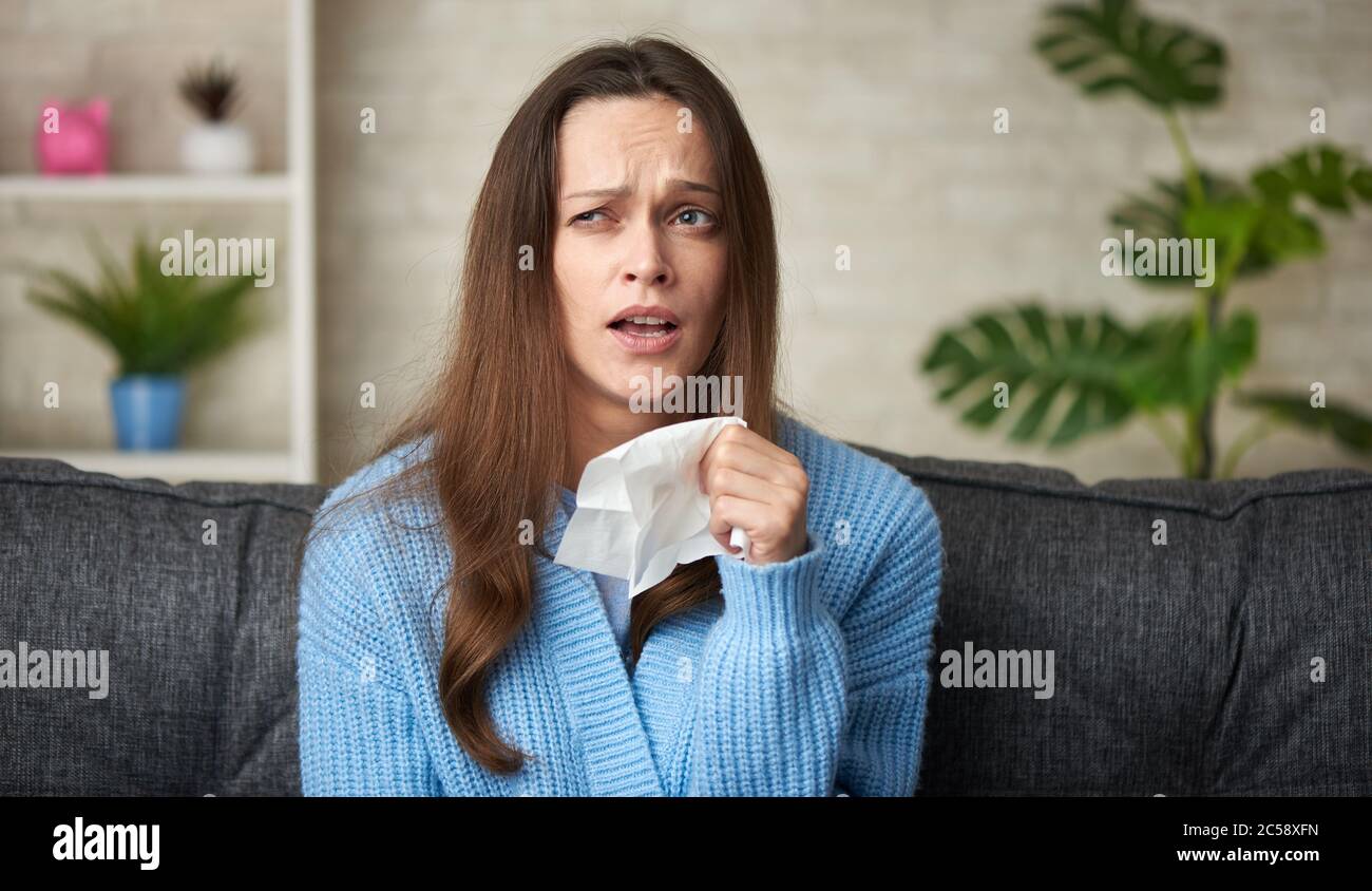 Portrait of attractive woman caught cold Stock Photo