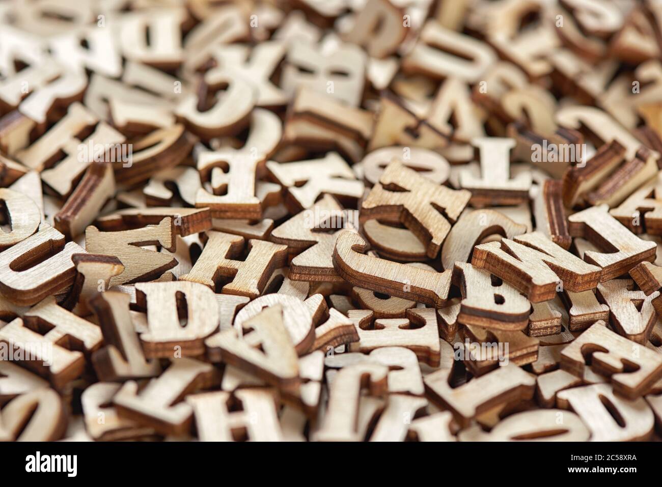 Heap of wooden letters close up Stock Photo