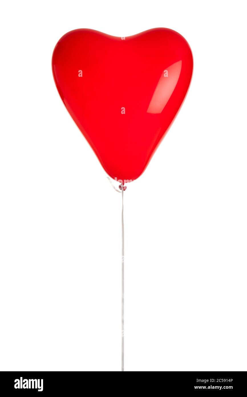 red, heart-shaped balloon isolated on white background Stock Photo - Alamy