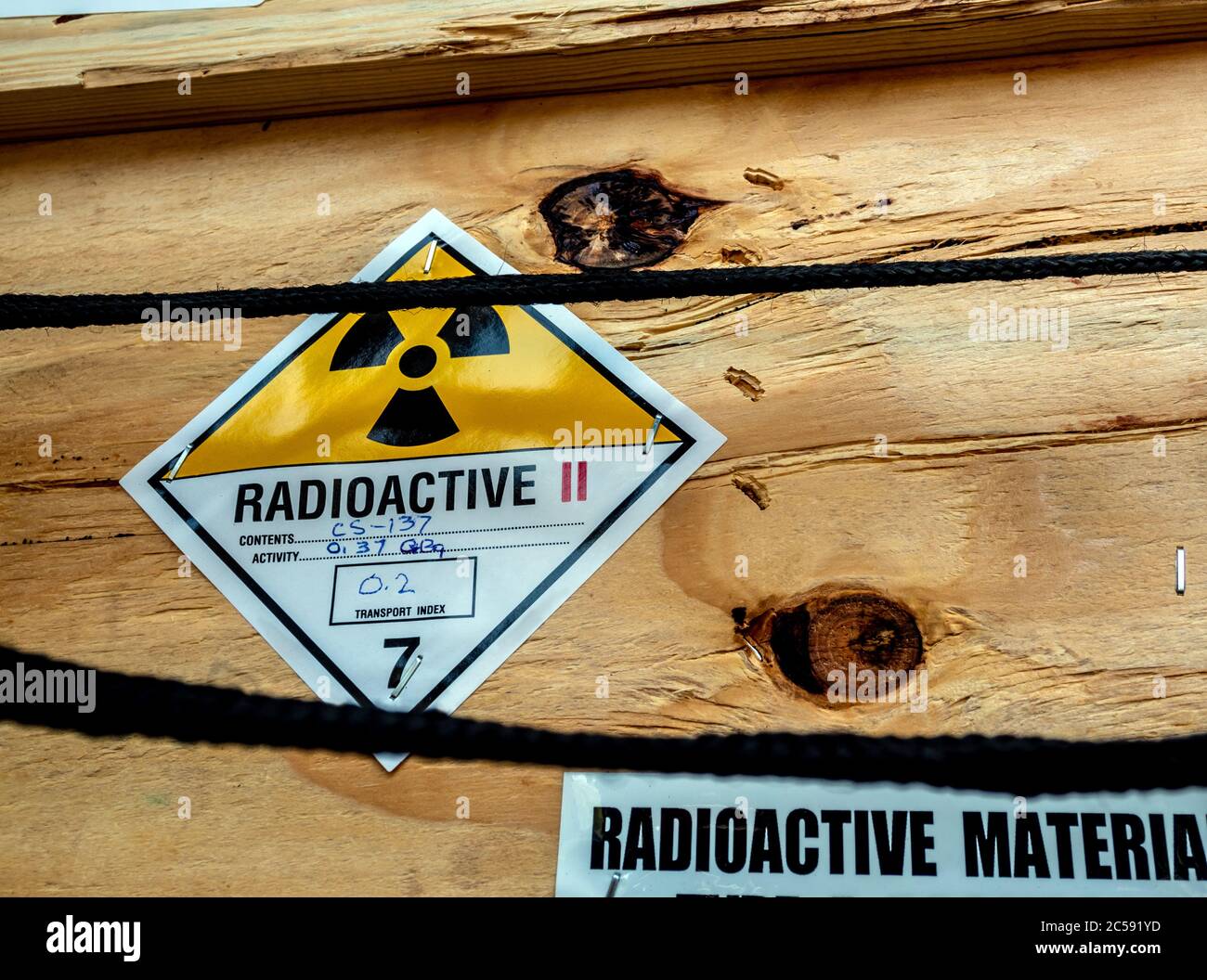 The radioactive material label beside the transportation wooden box