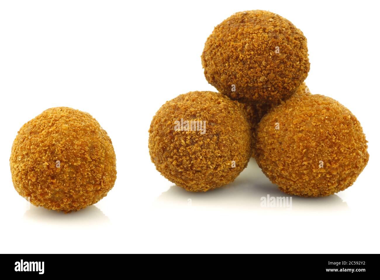 a real traditional Dutch snack called 'bitterballen' on a white background Stock Photo